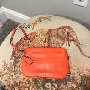 Orange coach wristlet
